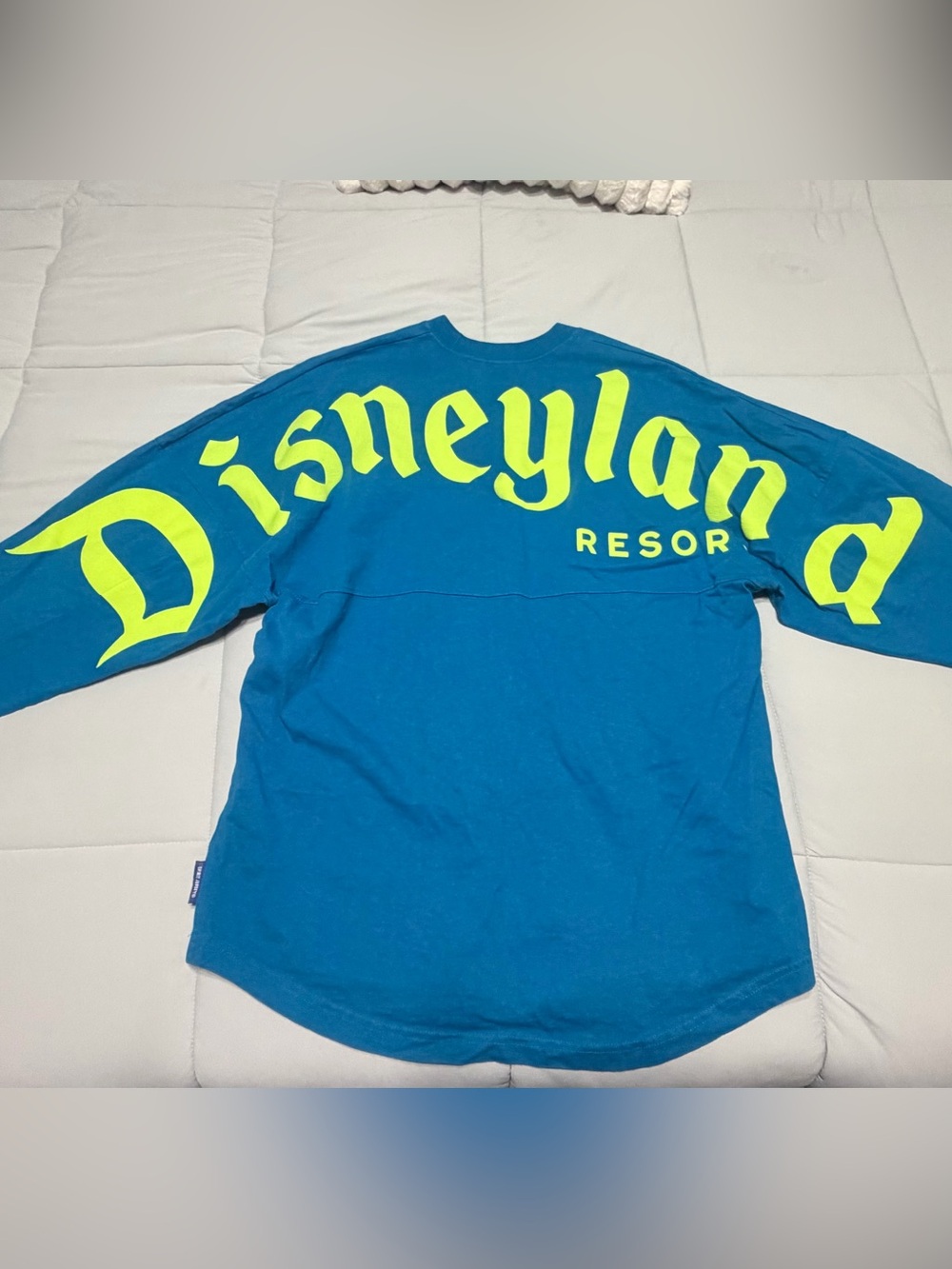 Disney Spirit Jersey Long Sleeve Teal Shirt with Neon Yellow Disneyland Graphics